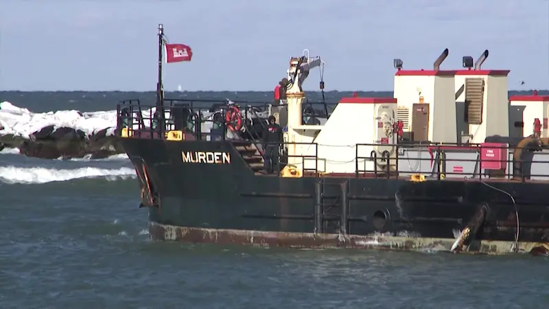 Story image: Emergency dredging underway in Montauk to create safe conditions for fishing boats