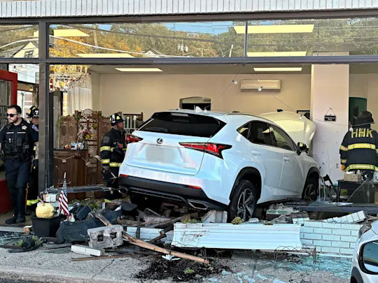 Car crashes into salon
