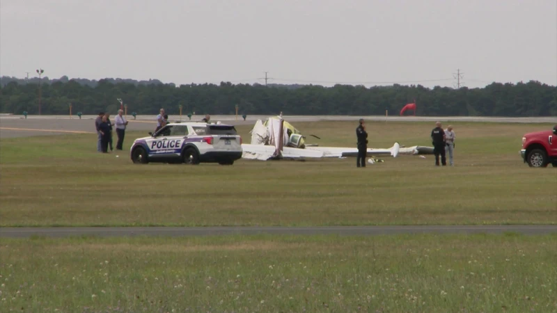 Story image: Pilot, passenger from Virginia identified as victims in MacArthur Airport crash