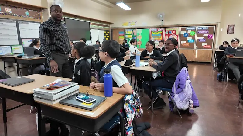 Story image: Catholic students return to class as statewide phone rules take effect in public schools
