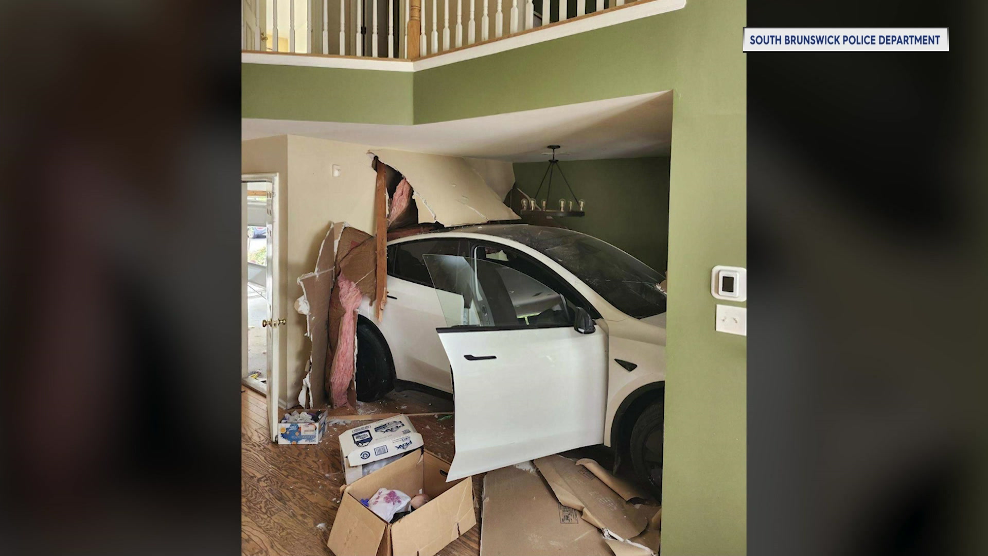 Crash lands Tesla in kitchen of South Brunswick home