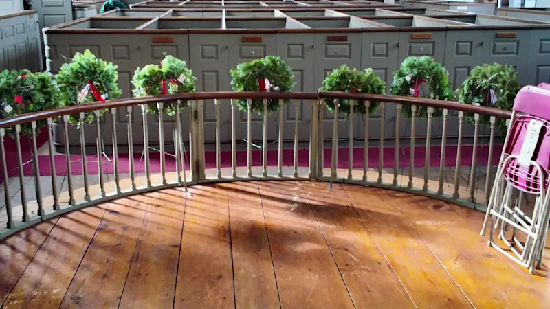 Story image: Respecting the sacrifice: Volunteers in Mount Vernon lay wreaths on graves of US service members