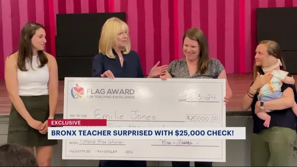 Morris Heights teacher surprised with $25,000 check for teaching excellence 