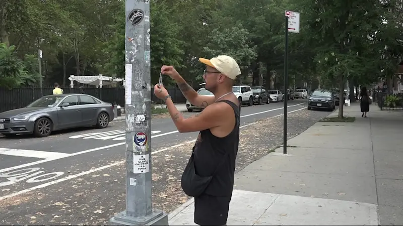 Story image: Greenpoint teacher turns grief into joy with custom pup stickers spotted around the borough