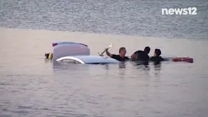 VIDEO: Watch as a team of first responders rescue a man from a car that went into the water in Patchogue