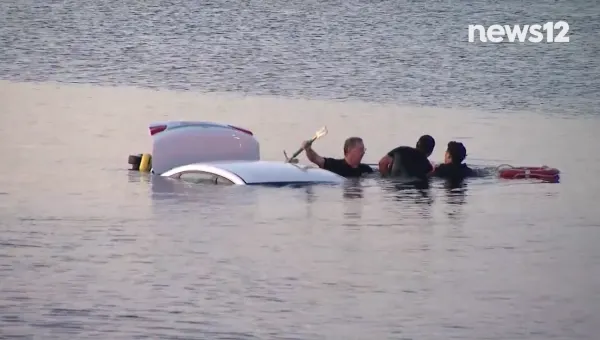 VIDEO: Watch as a team of first responders rescue a man from a car that went into the water in Patchogue