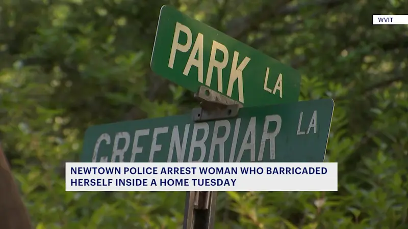 Story image: Police: Newtown woman arrested after barricading herself inside home