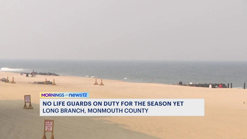 Story image: News 12 beats the heat today at Long Branch beach