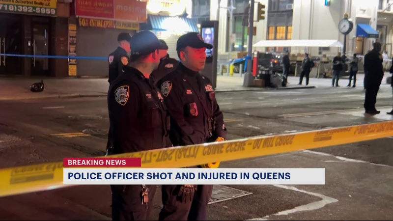 Story image: Police officials: NYPD officer, female bystander shot in Queens; suspect killed