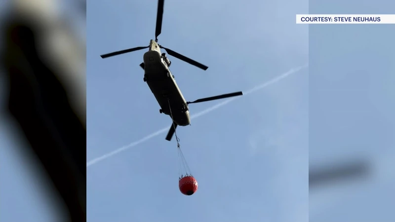 Story image: Chinook helicopters, 'smoke jumpers' part of aggressive wildfire attack in Greenwood Lake 