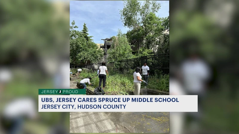 Story image: Jersey Proud: UBS employees help clean up Jersey City middle school