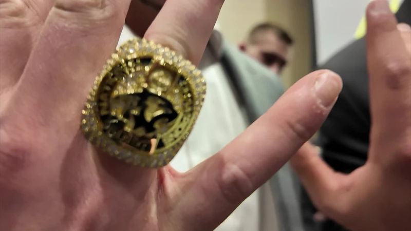 Story image: Adelphi men's lacrosse team receives championship rings