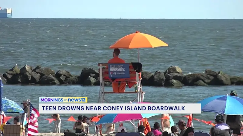 Story image: Woman dies after being pulled from water at Manhattan Beach