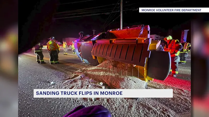 Story image:  Officials: Sanding truck flips in Monroe; no injuries reported