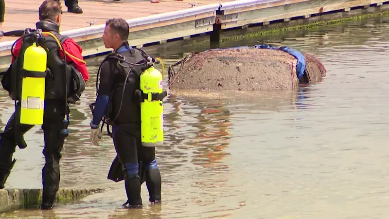 Story image: Independent divers, police find car in Mount Sinai Harbor with human remains inside