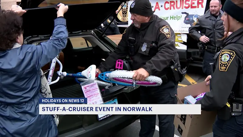 Story image: Norwalk police hold annual Stuff-a-Cruiser toy drive at local Walmart