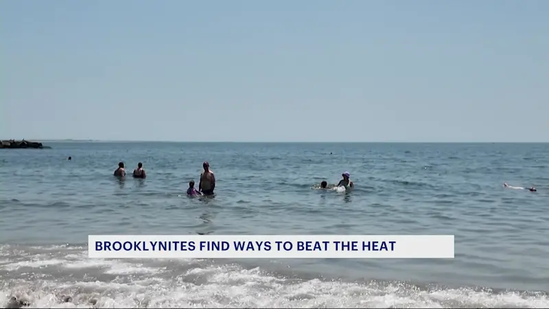 Story image: Brooklyn beachgoers find ways to beat the heat in Coney Island