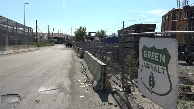 Story image: Greenpoint residents say they are overwhelmed with burning tar smell, demand action from Green Asphalt Plant