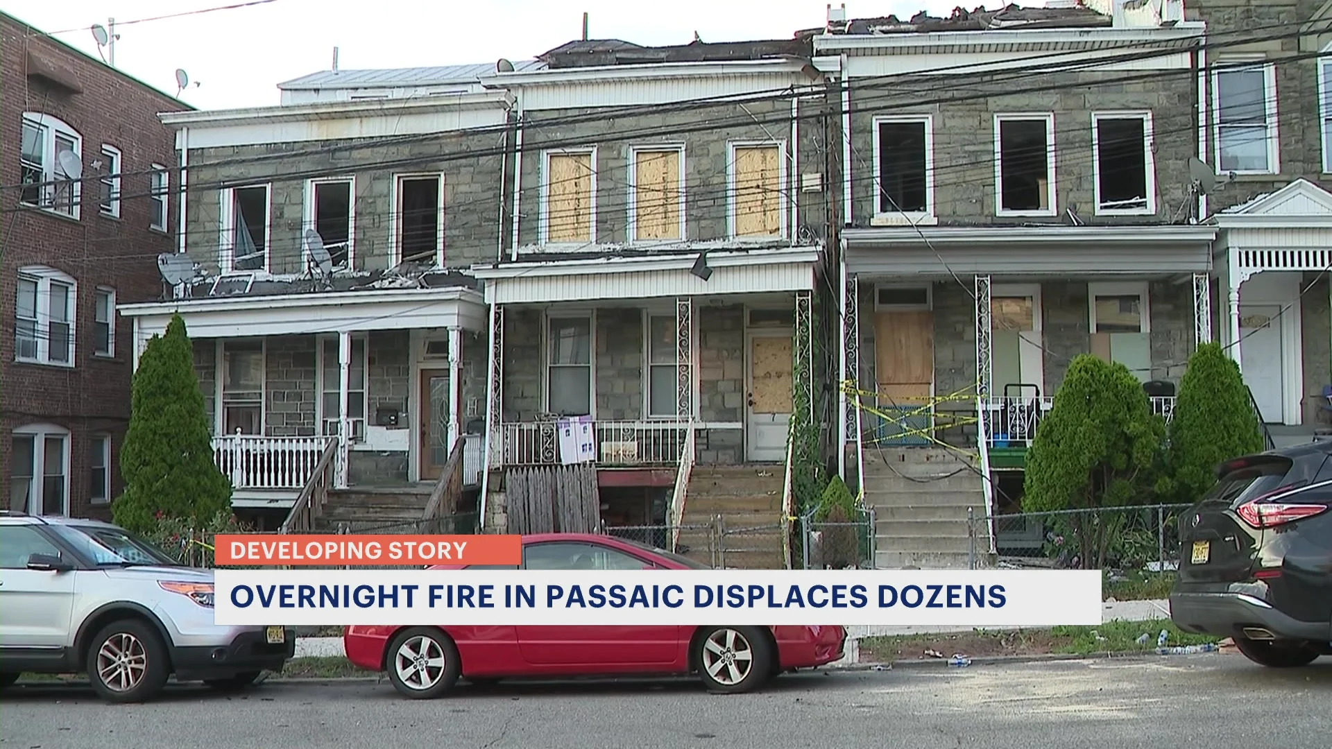 Officials: Dozens displaced, firefighter hurt in overnight Passaic fire