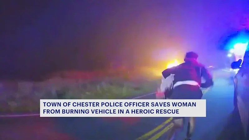 Story image: Bodycam footage: Hudson Valley police officer pulls driver from burning car