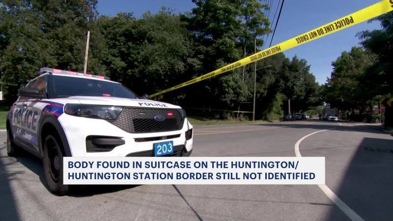 Story image: Police: Body found in suitcase near apartment building on border of Huntington, Huntington Station 