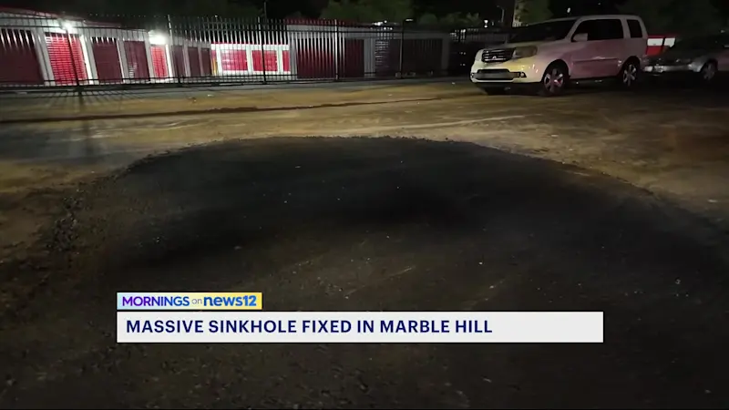 Story image: Roads reopen as sinkhole is repaired in Marble Hill