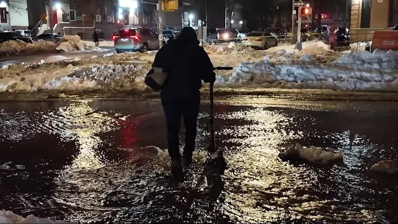 Story image: Water main break in Morrisania floods roads; DEP crews investigate source