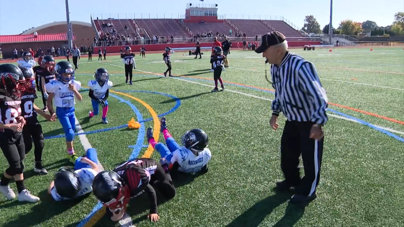 Story image: There is no stopping Long Island's 97-year-old football referee