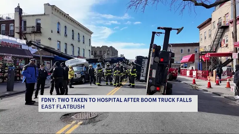 Story image: Boom truck falls into building, parked van in Flatbush area; 2 injured