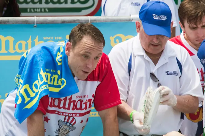 Story image: Joey 'Jaws' Chestnut reclaims title in Famous hot dog eating contest, wins 17th Mustard Belt