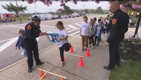 Kids get up-close-and personal tour of Suffolk police headquarters during Police Week
