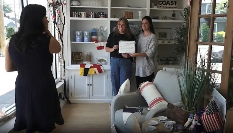 Story image: Seaford store owners receive $5,000 grant from Optimum Business