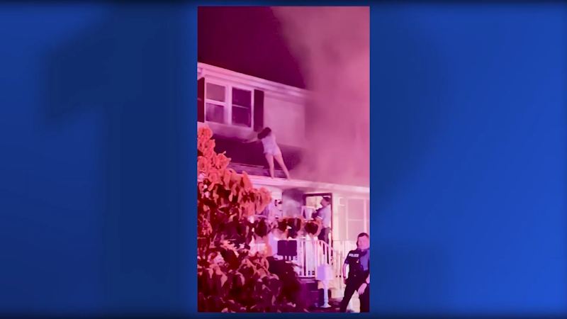 Story image: Dramatic video shows rescue from roof during North Plainfield fire