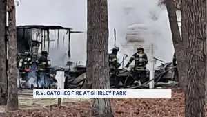 Authorities: RV catches fire at park in Shirley