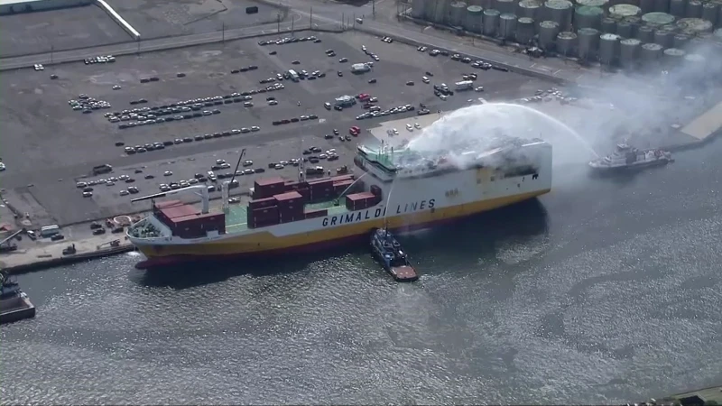 Story image: 1 year later: Remembering the Port Newark cargo ship fire that killed 2 firefighters