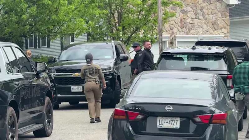 Story image: FBI, NYPD and US Customs seen at Tuxedo home of Russian oil executive