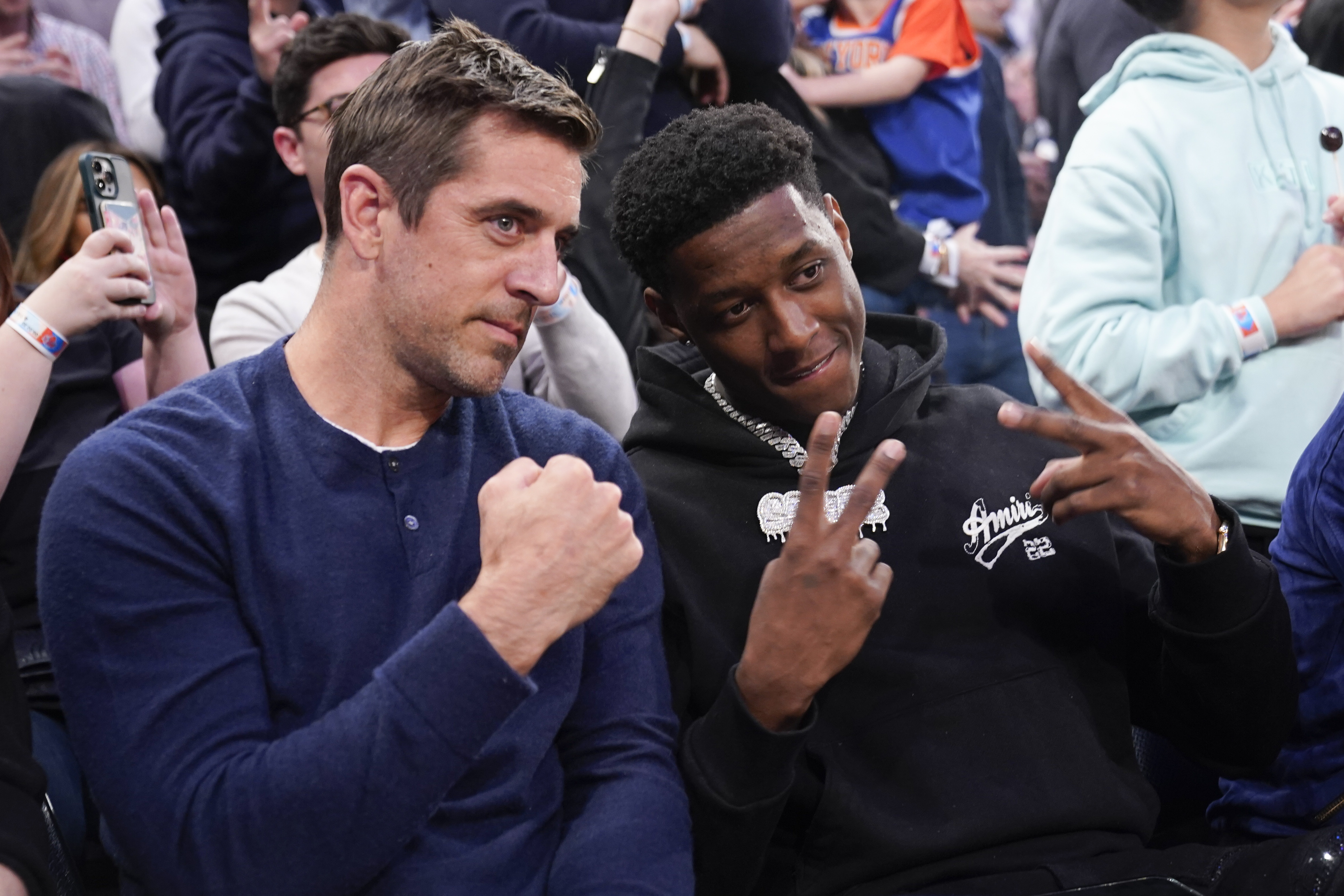 Aaron Rodgers and Sauce Gardner