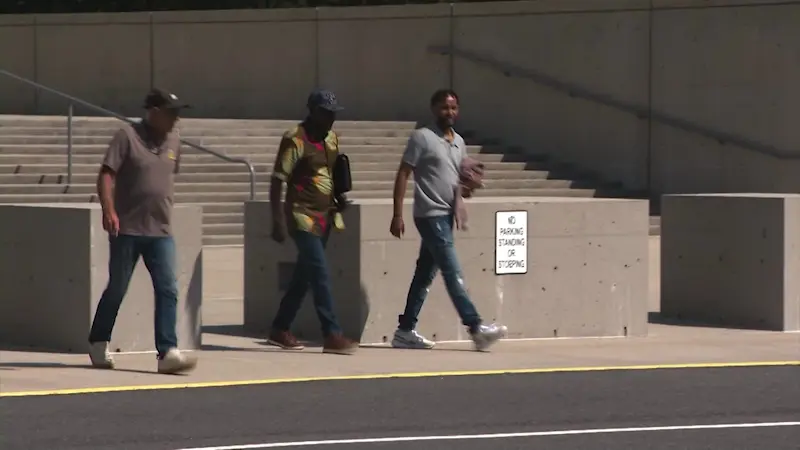 Story image: Beekeeper accused of hiding role in Rwandan genocide appears in federal court