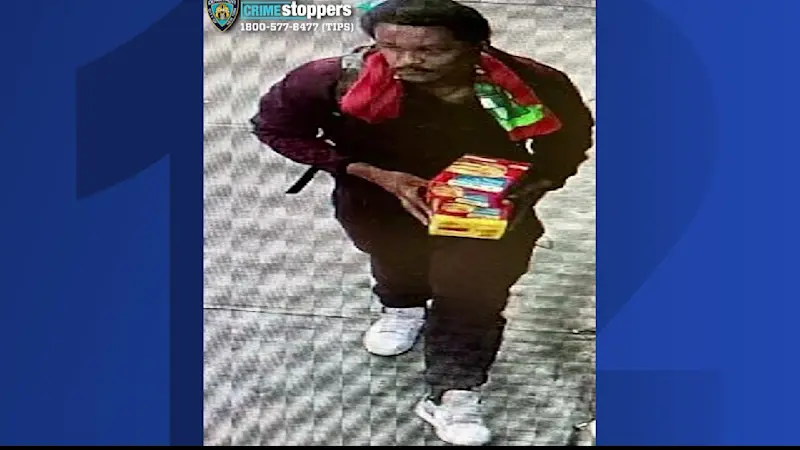 Story image: Photos released of bat-wielding thief in Parkchester robbery