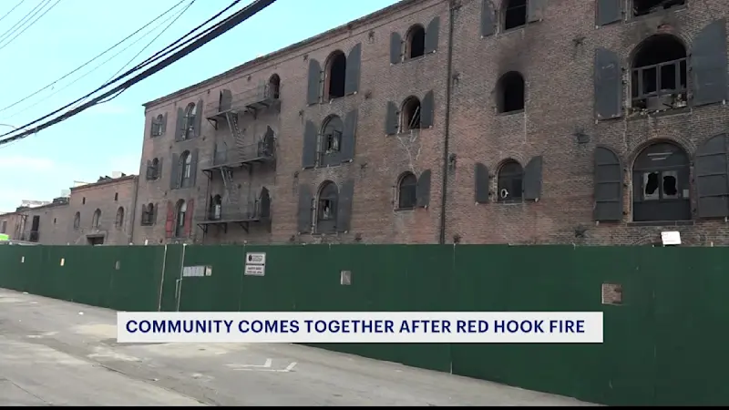 Story image: Picking up the pieces: Artists, business owners return to site of massive Red Hook warehouse fire
