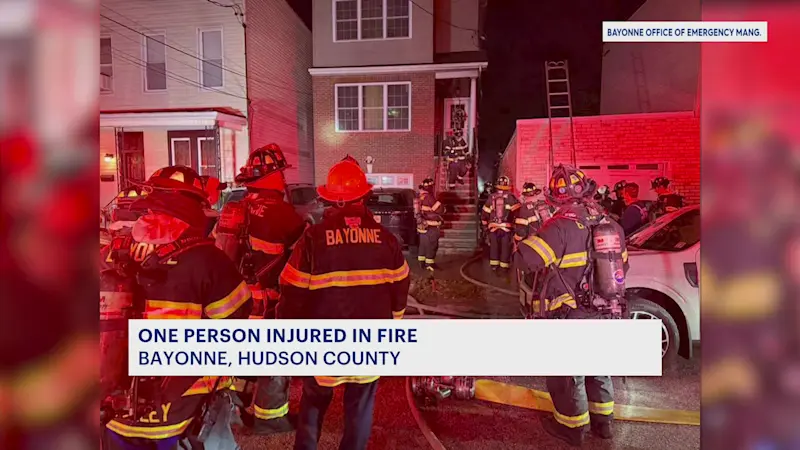 Story image: Officials: 1 person injured in fire that spread to 2 Bayonne homes