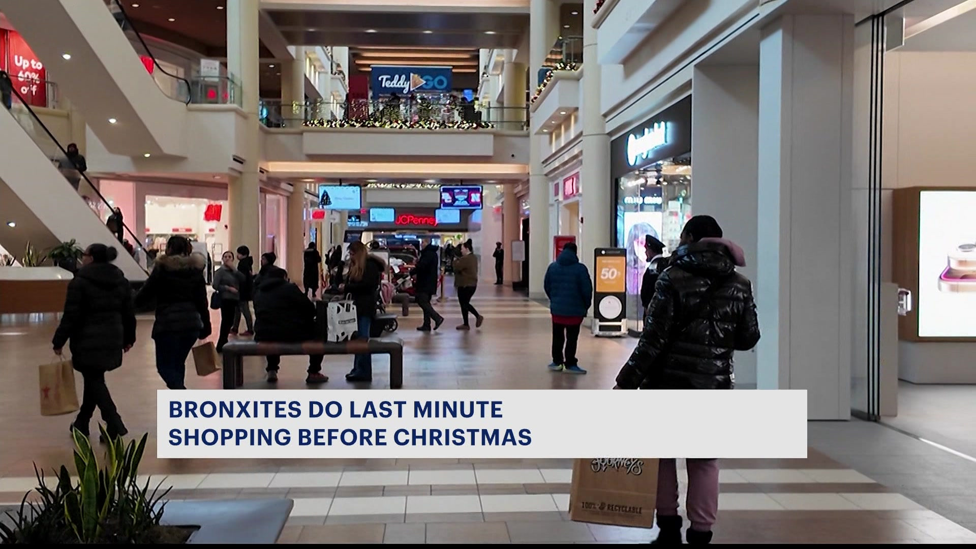 Mall at Bay Plaza packed with shoppers looking for last-minute gifts