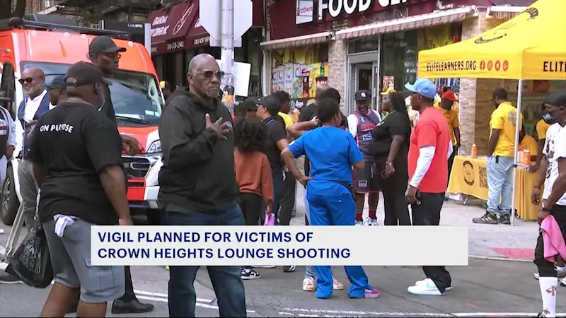 Story image: Community gathers for vigil after Crown Heights mass shooting 