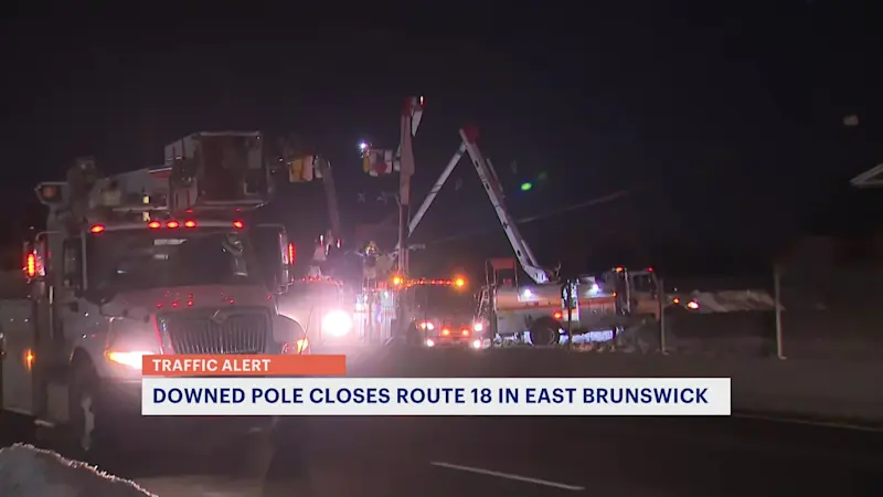 Story image: Section of Highway 18 closed in East Brunswick after crash takes down pole, wires