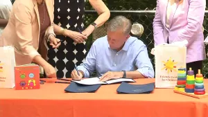 New Haven hosts bill signing ceremony for expanded child care program