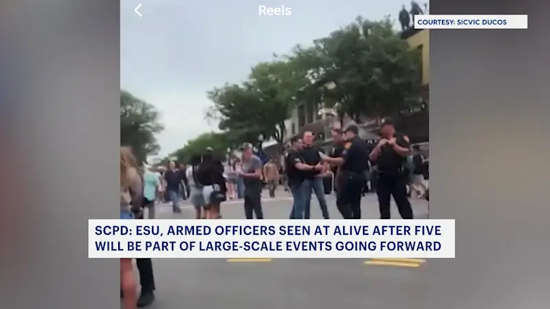 Story image: Suffolk County police with long guns spotted on rooftops during 'Alive After Five'