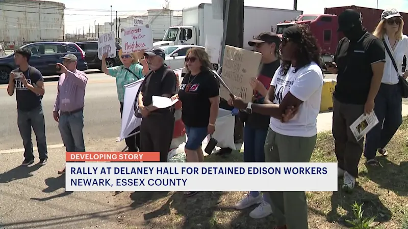 Story image:  Rally held for workers at Alba Wine and Spirits detained at Delaney Hall