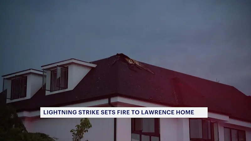 Story image: Fire marshal: Lightning strike sparks house fire in Lawrence; family displaced