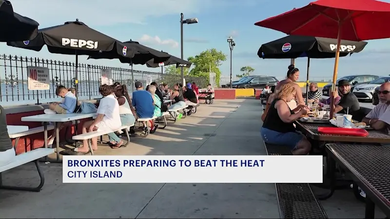 Story image: Residents descend on City Island for first day of summer