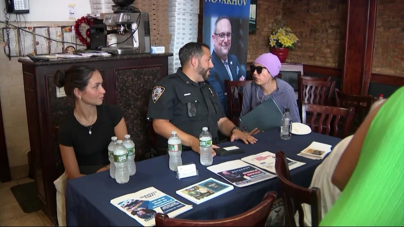 Story image: NYPD's 61st Precinct and AM Novakov team up with Sheepshead Bay pizzeria to hear community concerns
